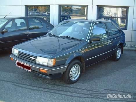 Mazda 323 1.3 LX SOLGT billede 1