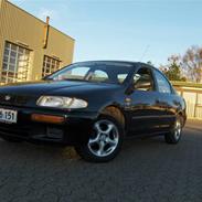 Mazda 323s (TOTALT SKADET)