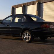 Mazda 323s (TOTALT SKADET)