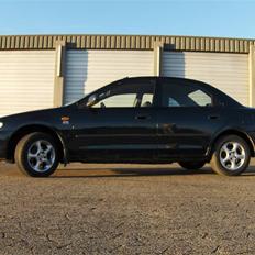 Mazda 323s (TOTALT SKADET)