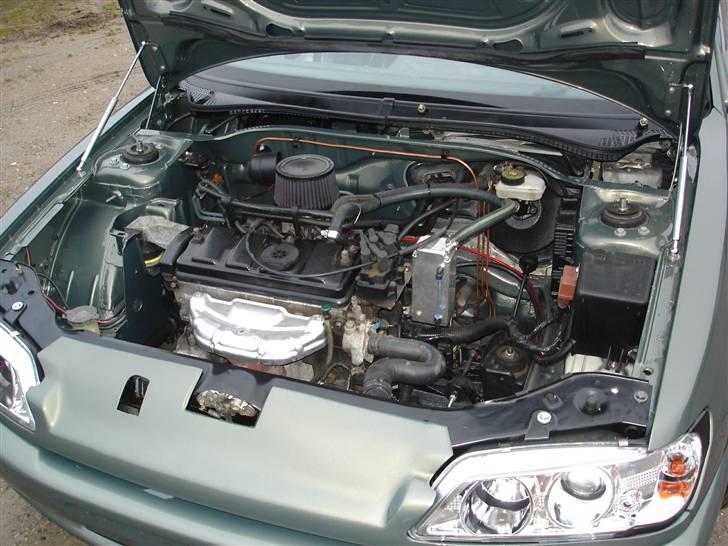 Peugeot 306  - der ligger ikke mange hypper pt men der er da rent og pænt billede 8