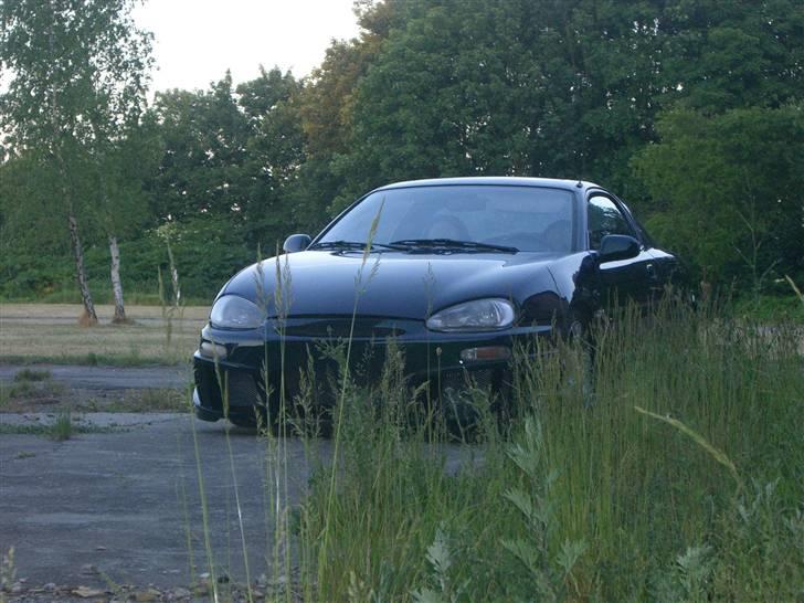 Mazda mx3 v6 - Gemmer sig i græsset. billede 1