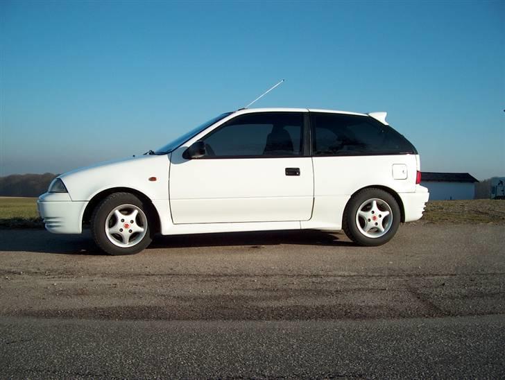 Suzuki Swift 1,3 GSI (SOLGT) billede 6