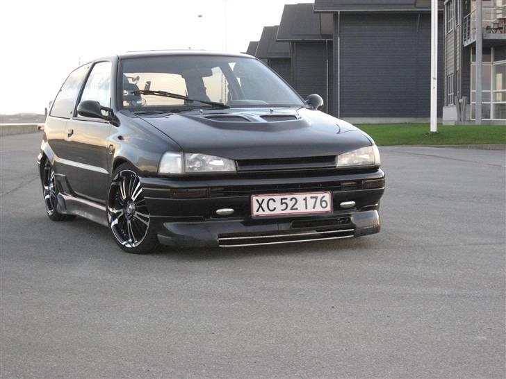 Daihatsu Charade 1.6 Byttet - Ja, bilen var for lav til vaskehallen, så den valgte ikke at vaske det nederst af sidskørterne! :( billede 1