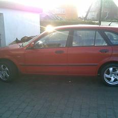 Mazda 323 f bj solgt