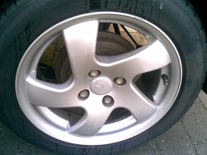 Mazda 323 f bj solgt billede 8