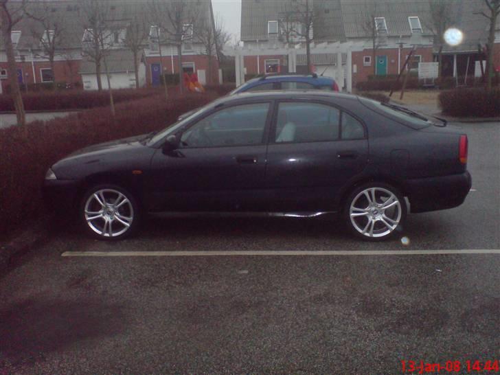 Mitsubishi Carisma Solgt - Nye sko til damen billede 14