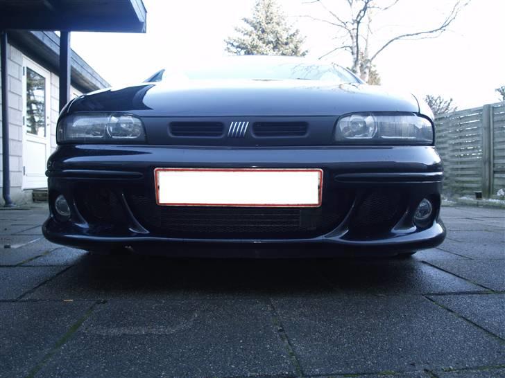 Fiat bravo solgt - set fra fronten ved jorden billede 6