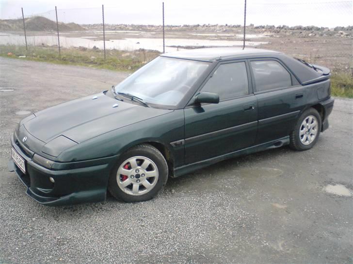 Mazda 323F GT SOLGT - kedelige vinterfælge billede 13