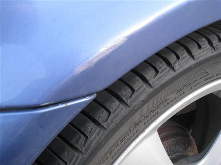 Toyota Paseo Solgt - lakskade højre bagskærm billede 6