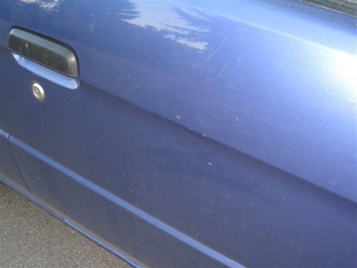 Toyota Paseo Solgt - lakskade ved højre dør billede 7