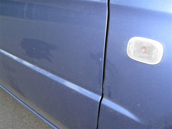 Toyota Paseo Solgt - lakskade ved højre dør billede 8