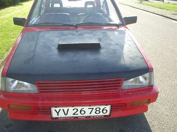 Daihatsu Charade - Totalskadet., billede 11