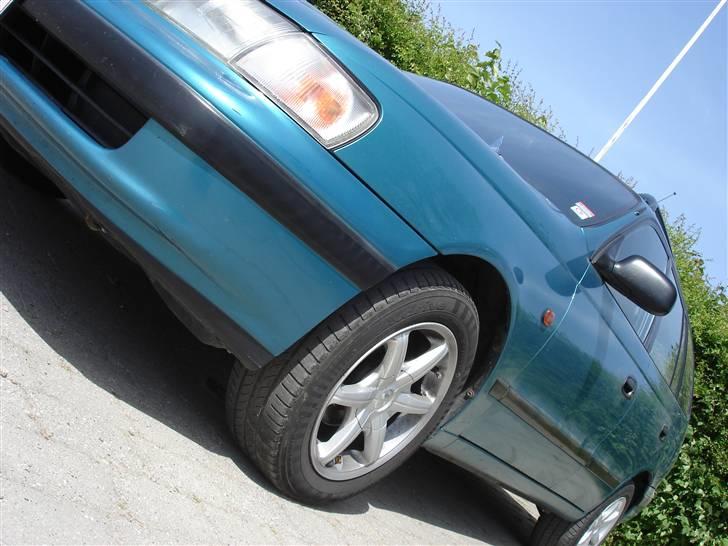 Toyota carina E Solgt billede 1