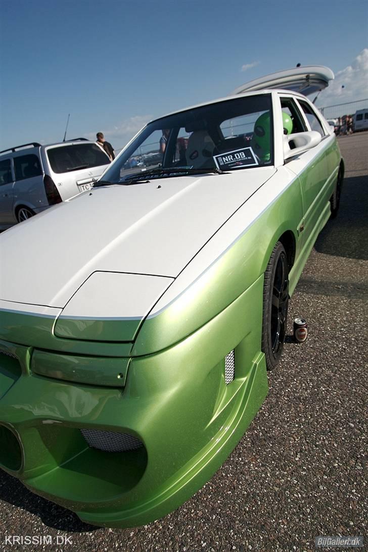 Mazda 323F Solgt billede 1