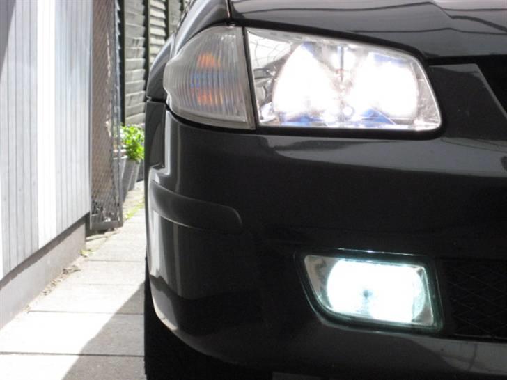 Mazda 323f bj solgt billede 1