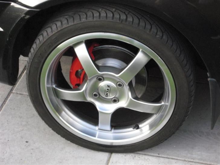 Mazda 323f bj solgt billede 4