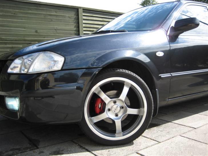 Mazda 323f bj solgt billede 5