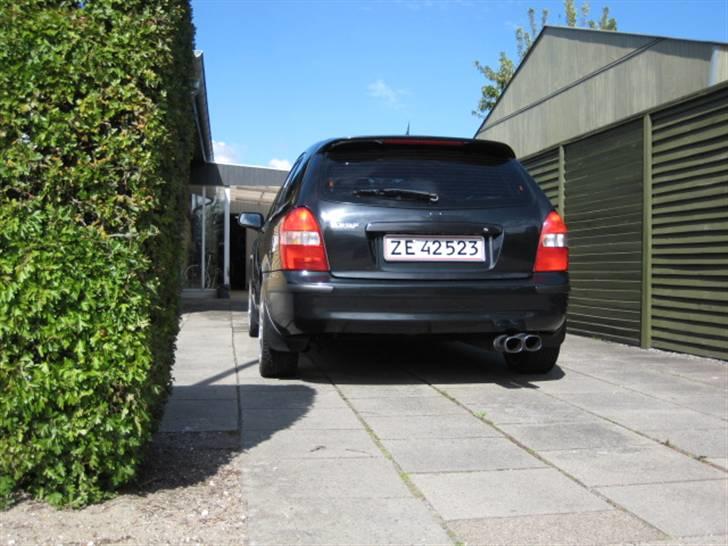 Mazda 323f bj solgt billede 6