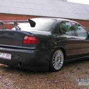 Ford Mondeo 2,0 solgt.