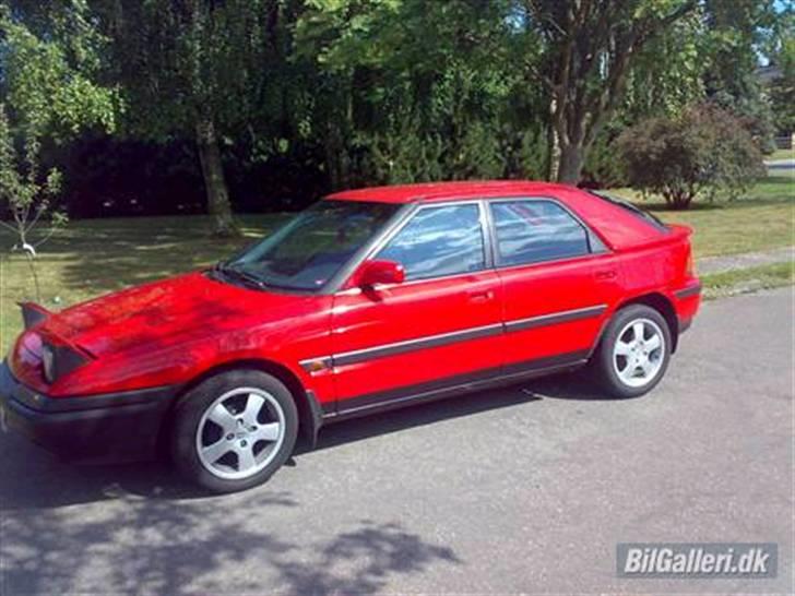 Mazda 323f Solgt billede 1