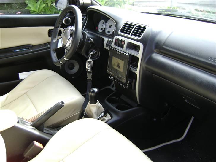 Mazda 323 f SOLGT billede 4