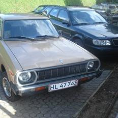 Datsun 120A F II guld bilen