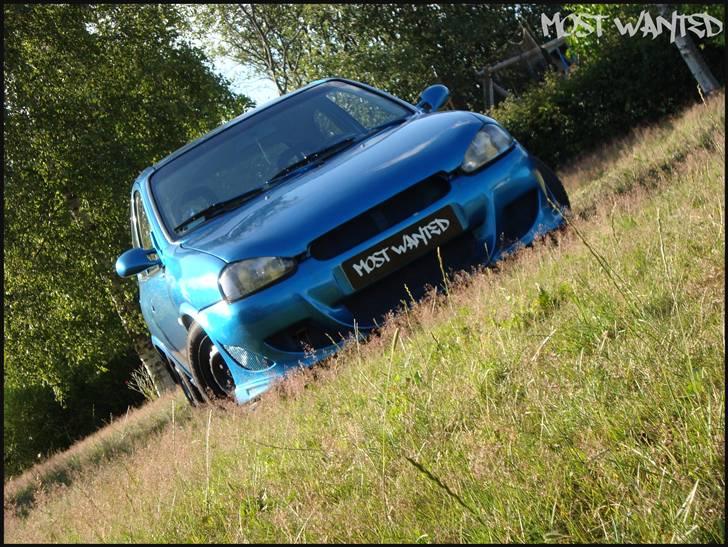 Opel ~Corsa~ 1,4i SE - SOLGT billede 1