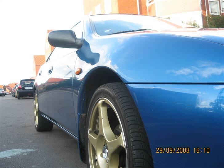 Mazda 323 F ( SOLGT ) billede 9