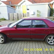 Mazda 323 f Solgt 28/07/09