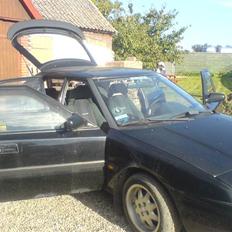 Mazda 323F GT (ophugget)