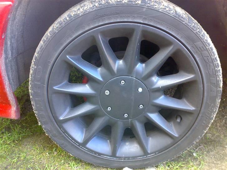 Ford Escort 1,8clx (solgt) - de alu. der sad på da jeg købte bilen, hold kæft de var grimme til bilen. billede 6