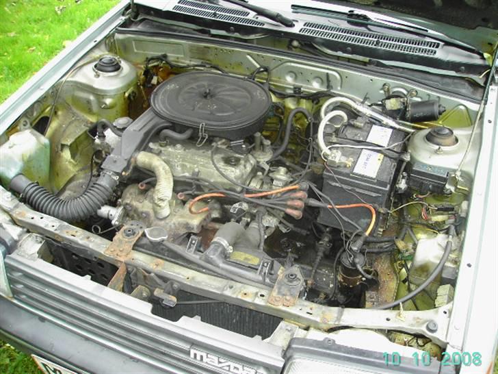 Mazda 323 1,3 bf (skrottet) - her er de "voldsomt" mange heste billede 10