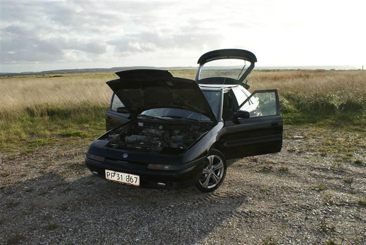 Mazda 323f **SOLGT** billede 1