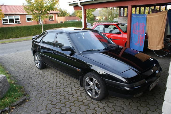 Mazda 323f **SOLGT** billede 8