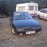 Mazda 323f lige blevet smadret