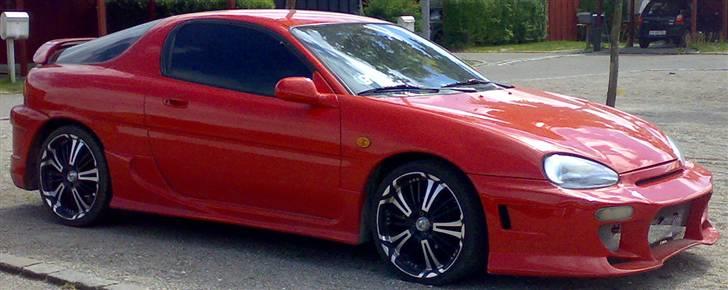 Mazda Mx-3 - Nu med side skørter billede 5