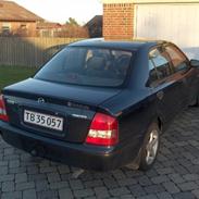 Mazda 323 s bj glx solgt