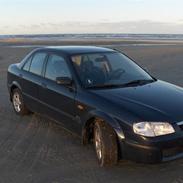 Mazda 323 s bj glx solgt