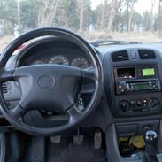 Mazda 323 s bj glx solgt