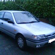 Nissan sunny slx 1.6 solgt