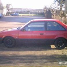 Mazda 323  -=*Solgt*=-