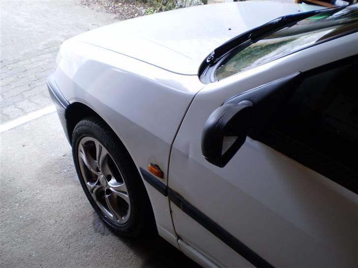 Peugeot 306 xl - med sommersutterne på  billede 1