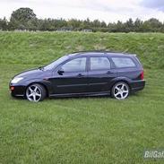 Ford focus st.car solgt..