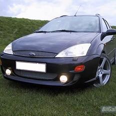 Ford focus st.car solgt..