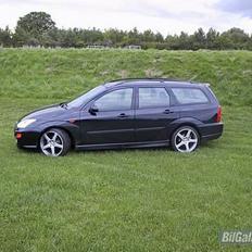 Ford focus st.car solgt..