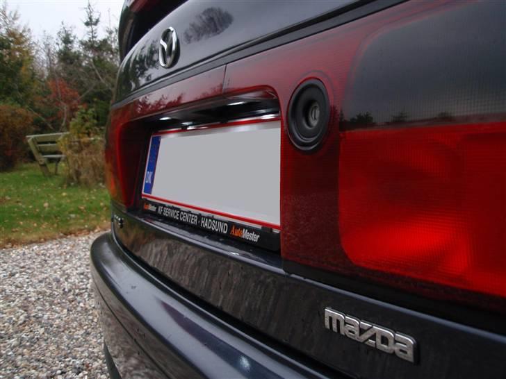 Mazda 323 BA Sedan 1,5 GLX - Xenon SMD dioder i Nummerplade lys. billede 9