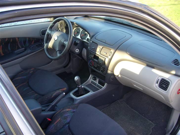 Nissan Almera 1,8 Sport SOLGT billede 4