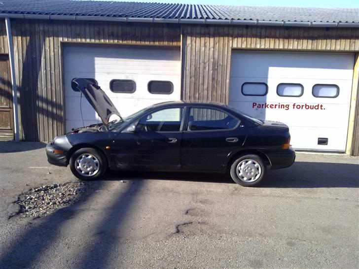 Chrysler neon - bemærk den "smarte" læderdækken på fronten. og de tarvelige plastkapsler billede 1