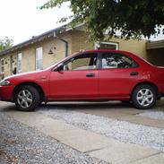 Mazda 323 Sedan TOTAL SKADET - SÆLGES I STUMPER